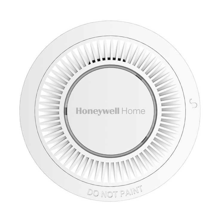 Okrągły biały czujnik dymu Honeywell Home R200S-N2 z otworami wentylacyjnymi i centralnym przyciskiem