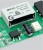 Zbliżenie na płytkę elektroniczną z kondensatorem i elementami SMD